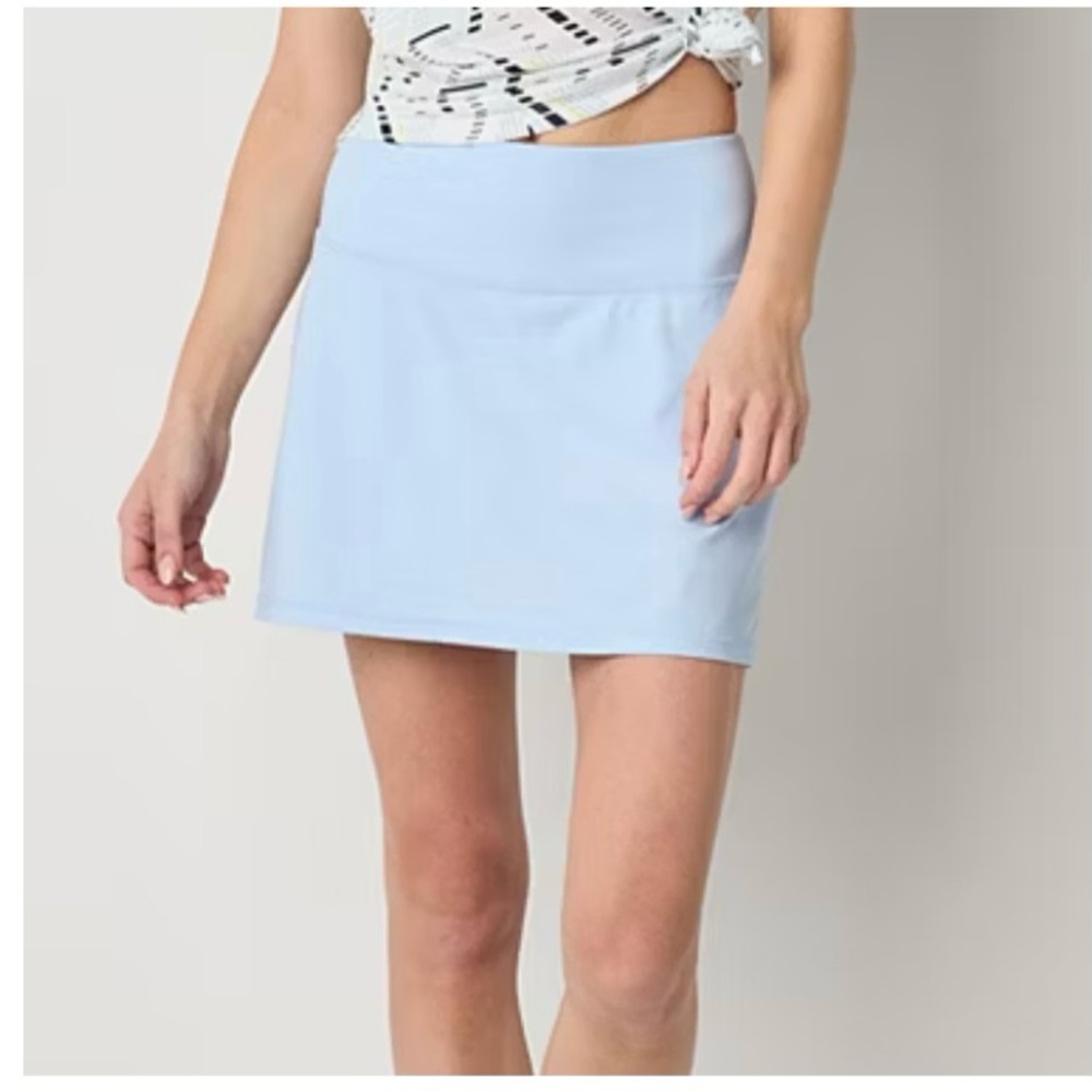 Xersion Women's Mini Tennis Skort in Soft Blue with matching shirt